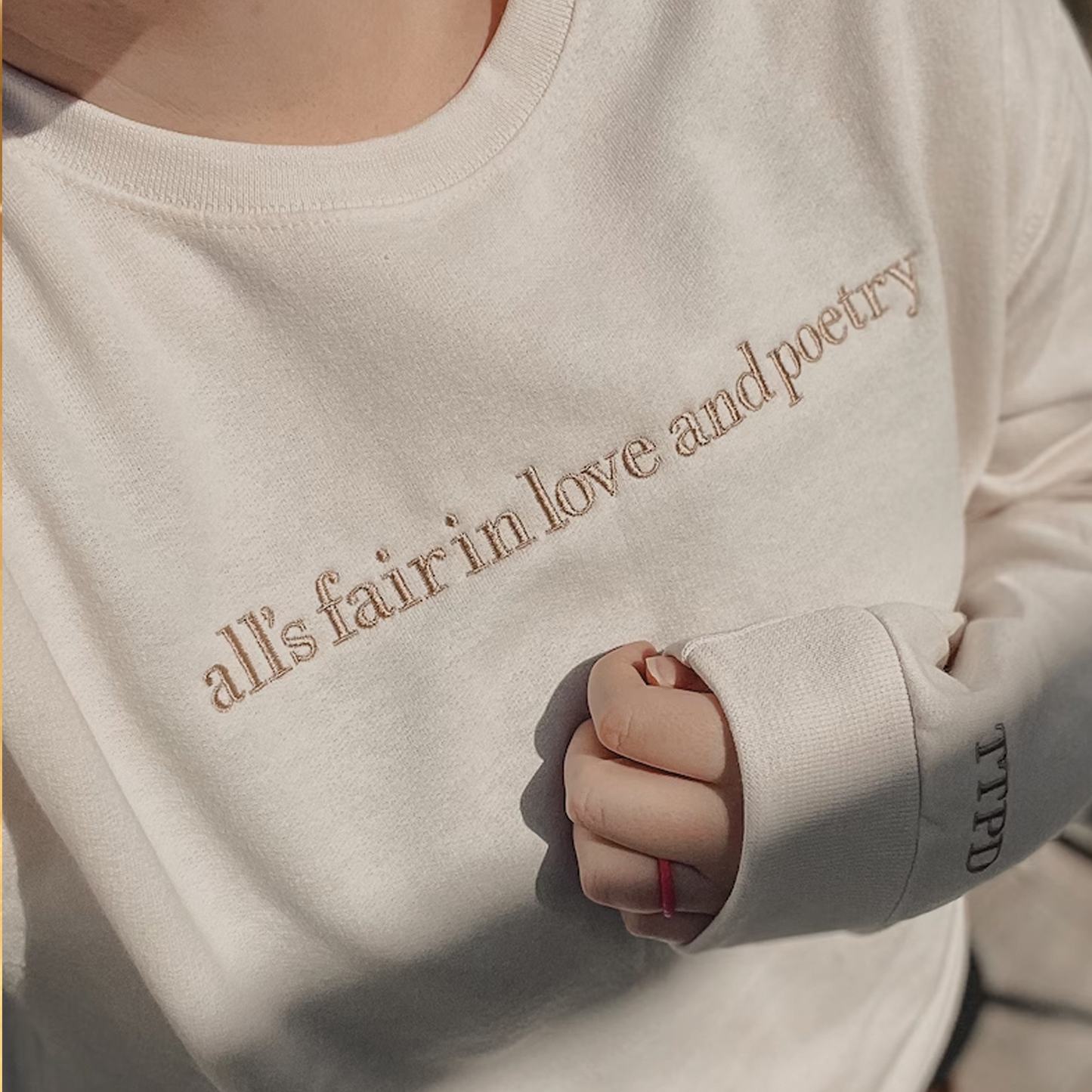 All's Fair in Love & Poetry TTPD Embroidered Sweatshirt