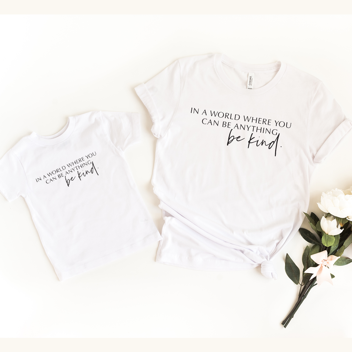 In a world where you can be anything ... Be Kind White T-Shirts